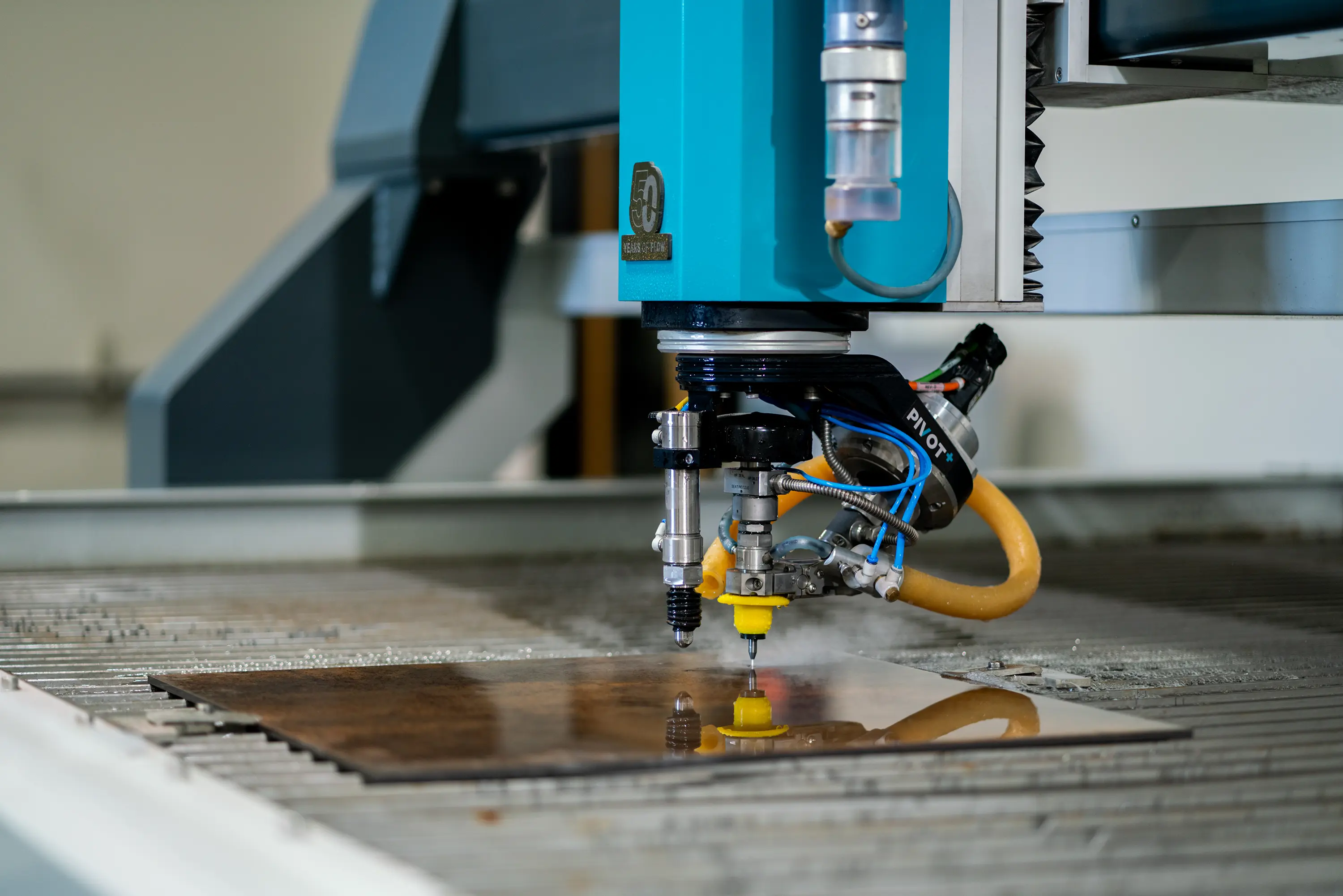 Pivot+ 5-axis waterjet cutting metal