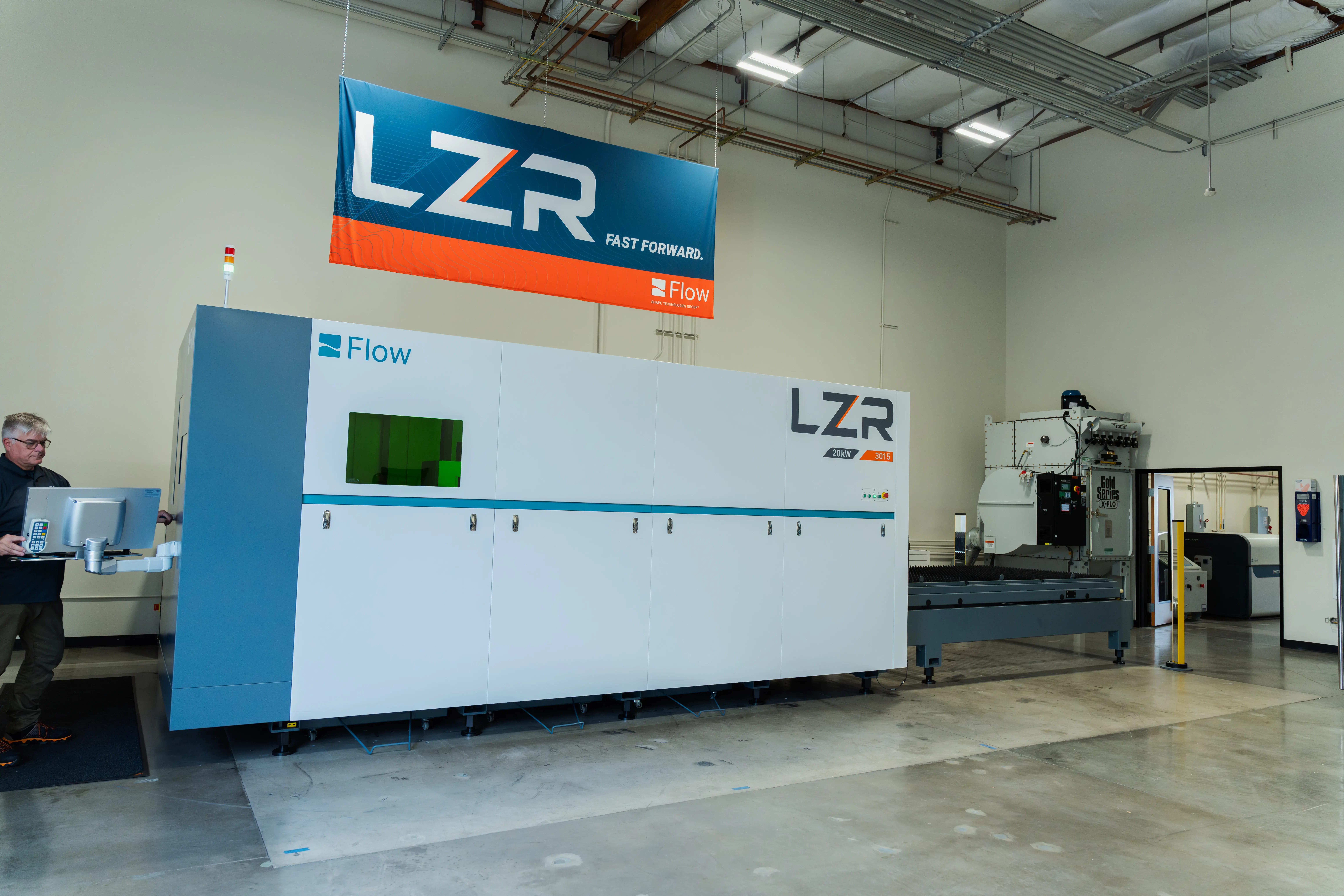 LZR fiber laser being operated by Flow employee