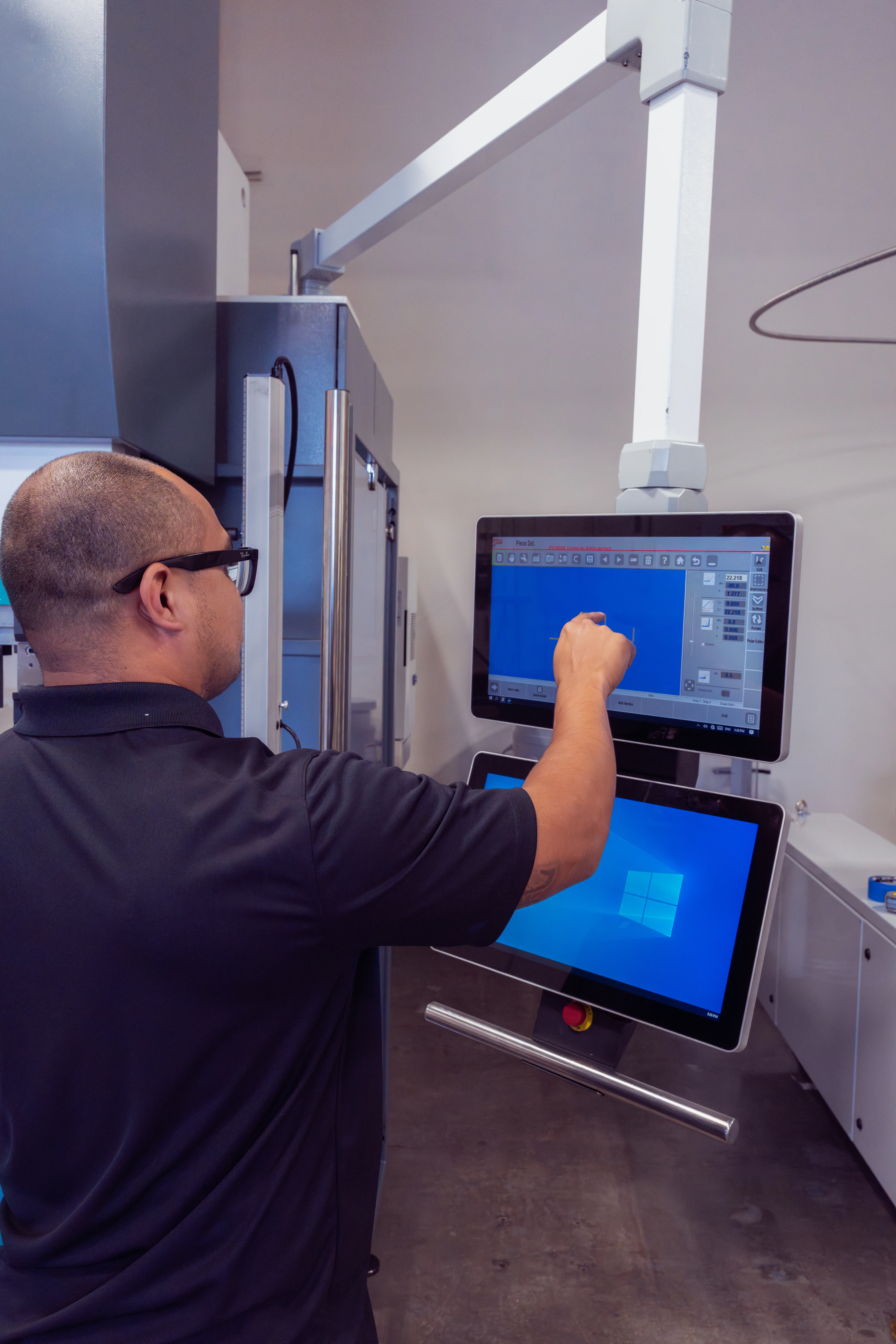 Dual screen operator station interface with operator utilizing the touchscreen capabilities